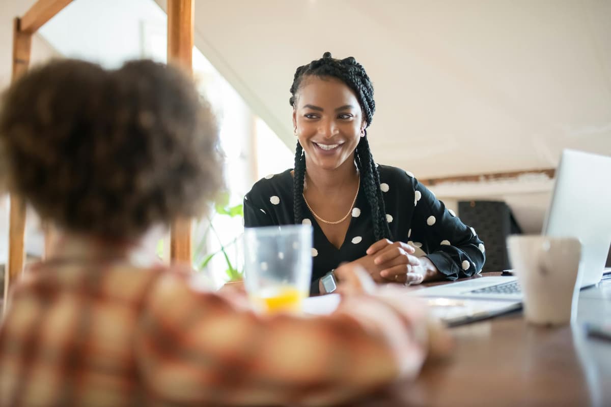 Lewamu Insurance Agency advisor speaking with a client